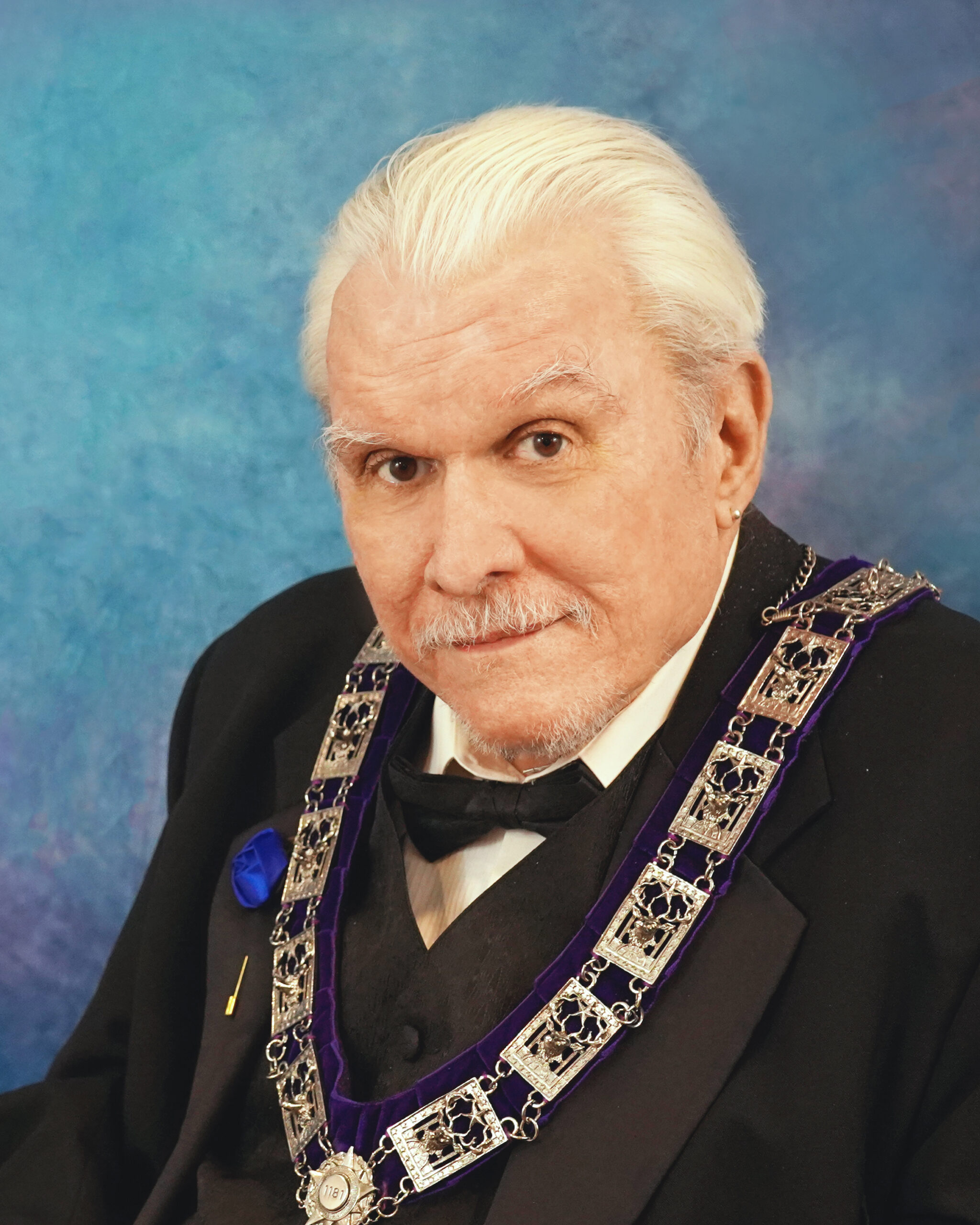 Trustee ~ Chairman of the Board